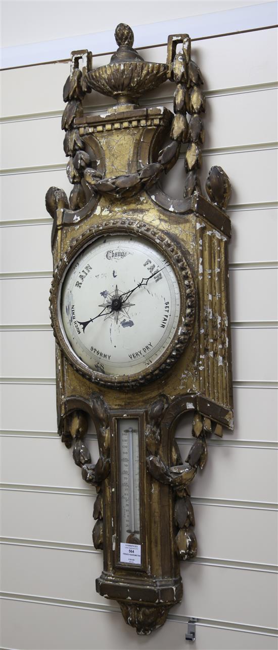 A 19th century French carved giltwood barometer, 3ft 5in.